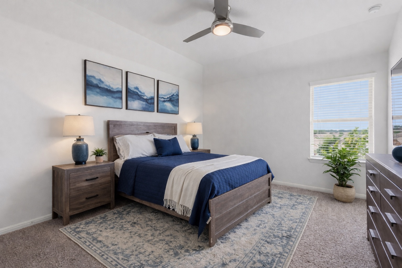 609 Allende Bend, Unit 130 Austin, TX 78748 - Photo 28 of 33 a bed room with a bed and a potted plant