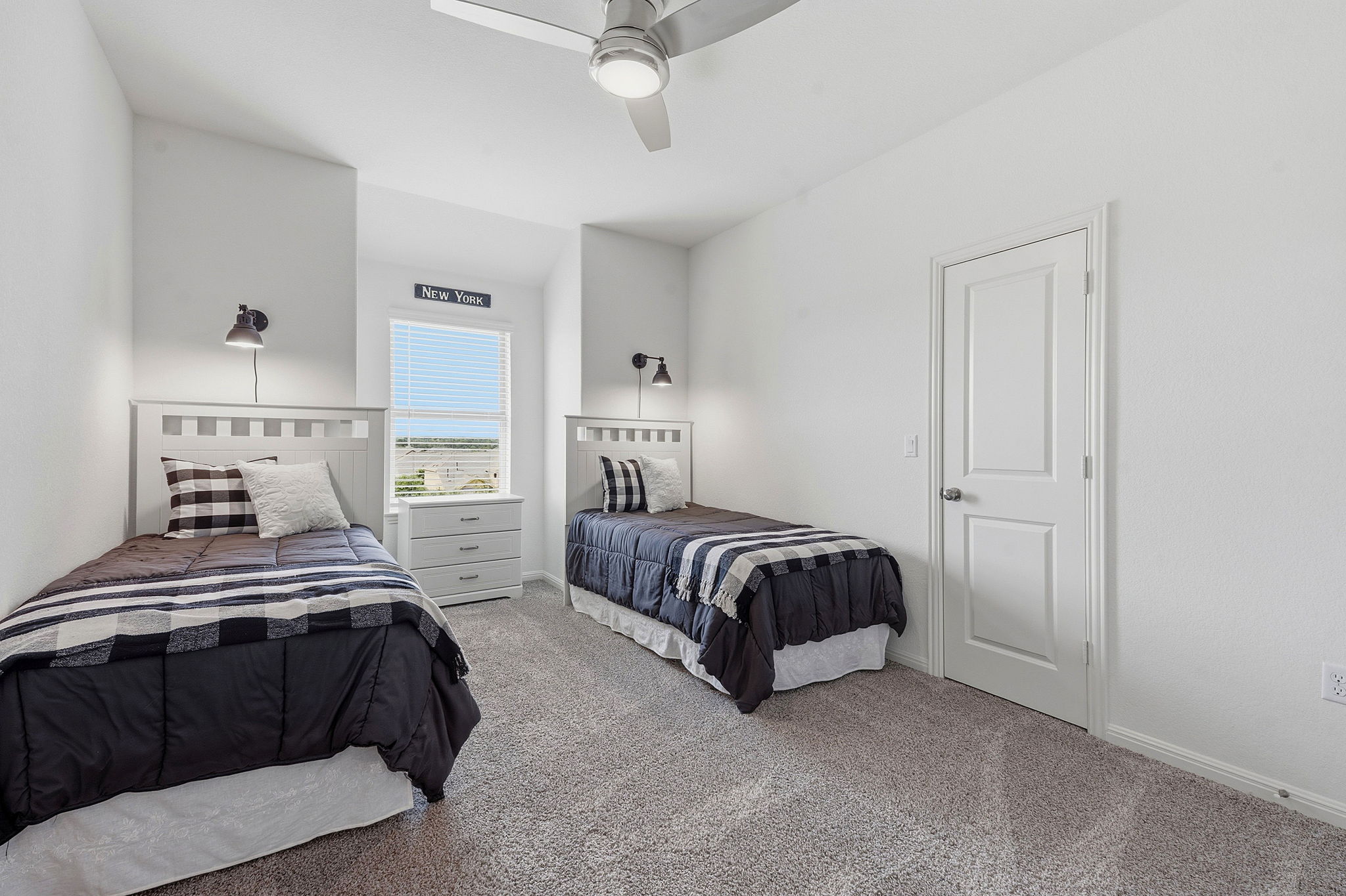 609 Allende Bend, Unit 130 Austin, TX 78748 - Photo 30 of 33 a bedroom with a bed and wooden floor