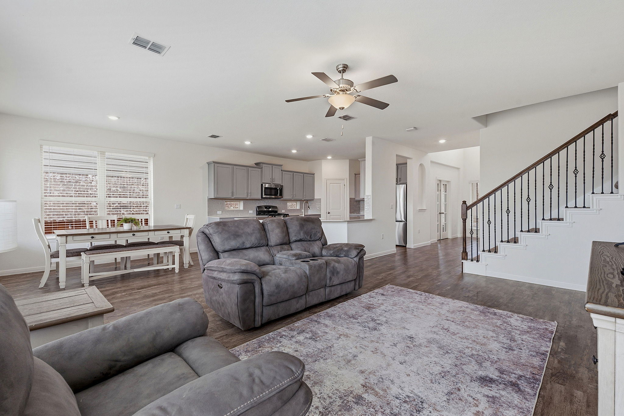 609 Allende Bend, Unit 130 Austin, TX 78748 - Photo 3 of 33 a living room with furniture and a window
