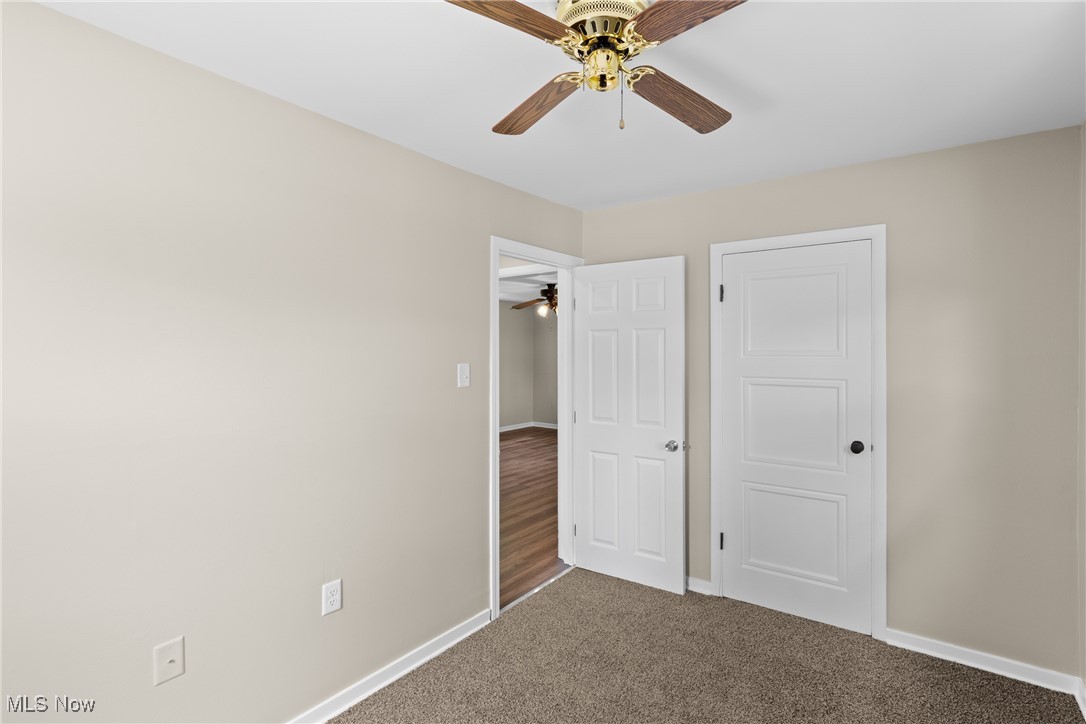 60880 Webb Heights Road Shadyside, OH 43947 - Photo 20 of 31 Unfurnished bedroom featuring carpet and ceiling fan