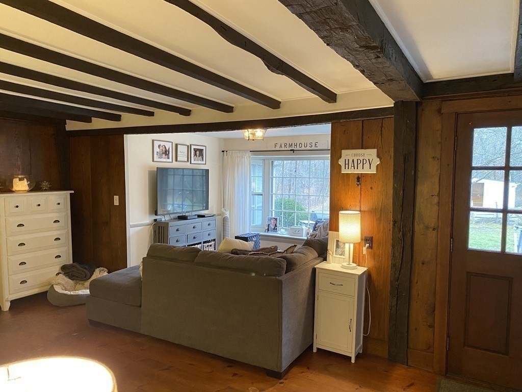 54 Northbridge Road Mendon, MA 01756 - Photo 11 of 39 a living room with furniture and a window