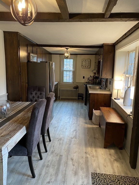 54 Northbridge Road Mendon, MA 01756 - Photo 13 of 39 a view of a livingroom with furniture and a window