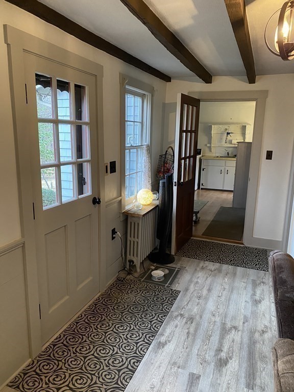 54 Northbridge Road Mendon, MA 01756 - Photo 17 of 39 a view of a hallway with wooden floor and staircase