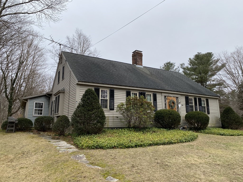 54 Northbridge Road Mendon, MA 01756 - Photo 2 of 39 a front view of a house with garden