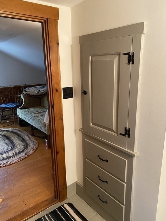 54 Northbridge Road Mendon, MA 01756 - Photo 25 of 39 a bathroom with a sink a mirror and shower