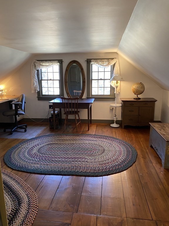 54 Northbridge Road Mendon, MA 01756 - Photo 26 of 39 a living room with furniture a window and a table