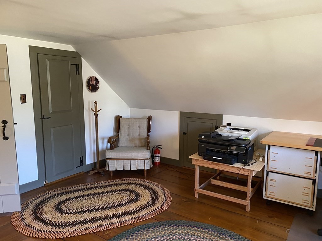 54 Northbridge Road Mendon, MA 01756 - Photo 27 of 39 a room with furniture and a rug