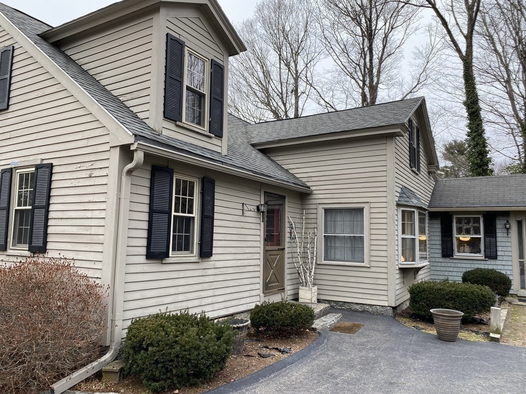 54 Northbridge Road Mendon, MA 01756 - Photo 32 of 39 a front view of a house with a yard