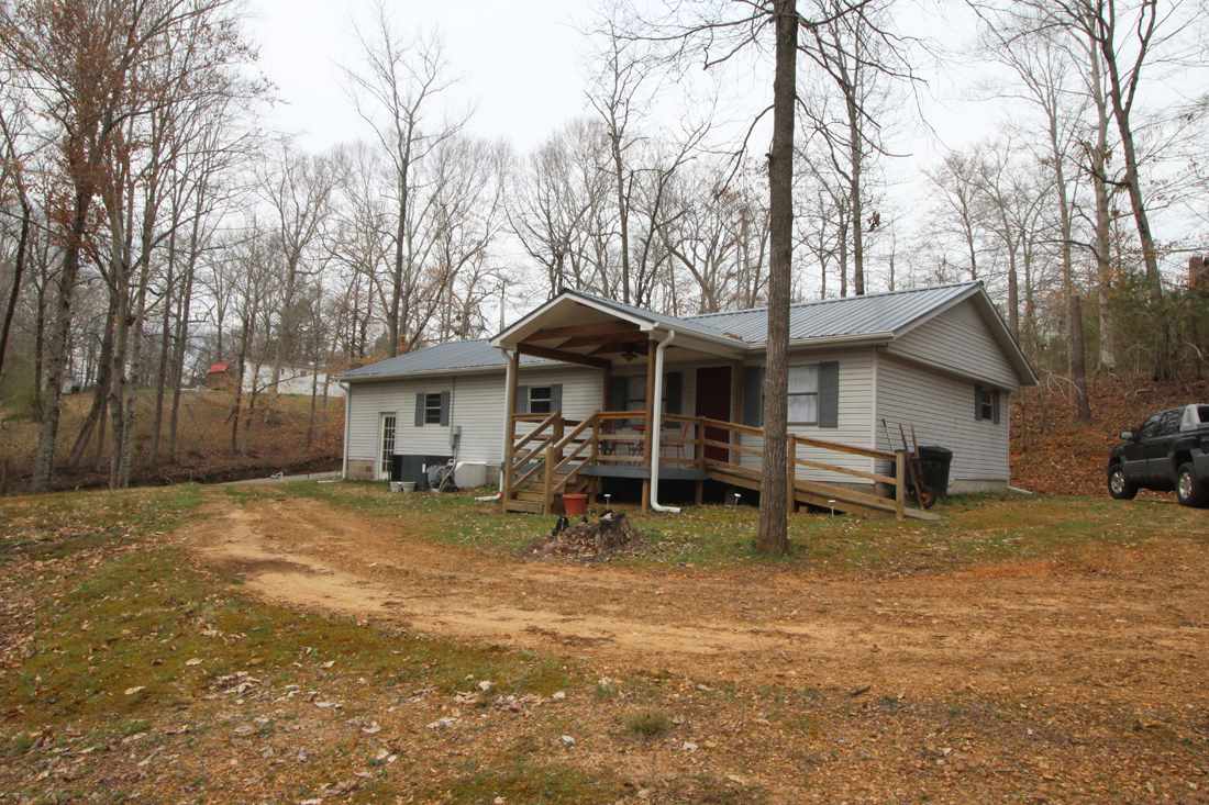 131 Chelsea Road Crump, TN 38327 - Photo 1 of 19 Spacious 4 Br around the corner from a public Boat Ramp...