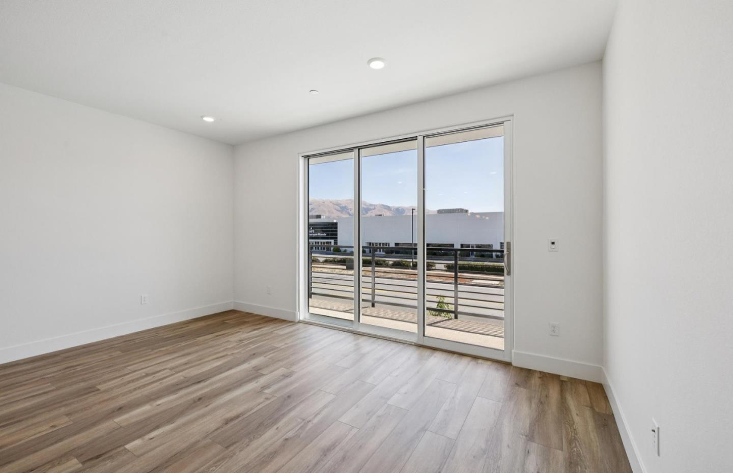 1357 Lilac Way Milpitas, CA 95035 - Photo 33 of 62 wooden floor in an empty room with a window