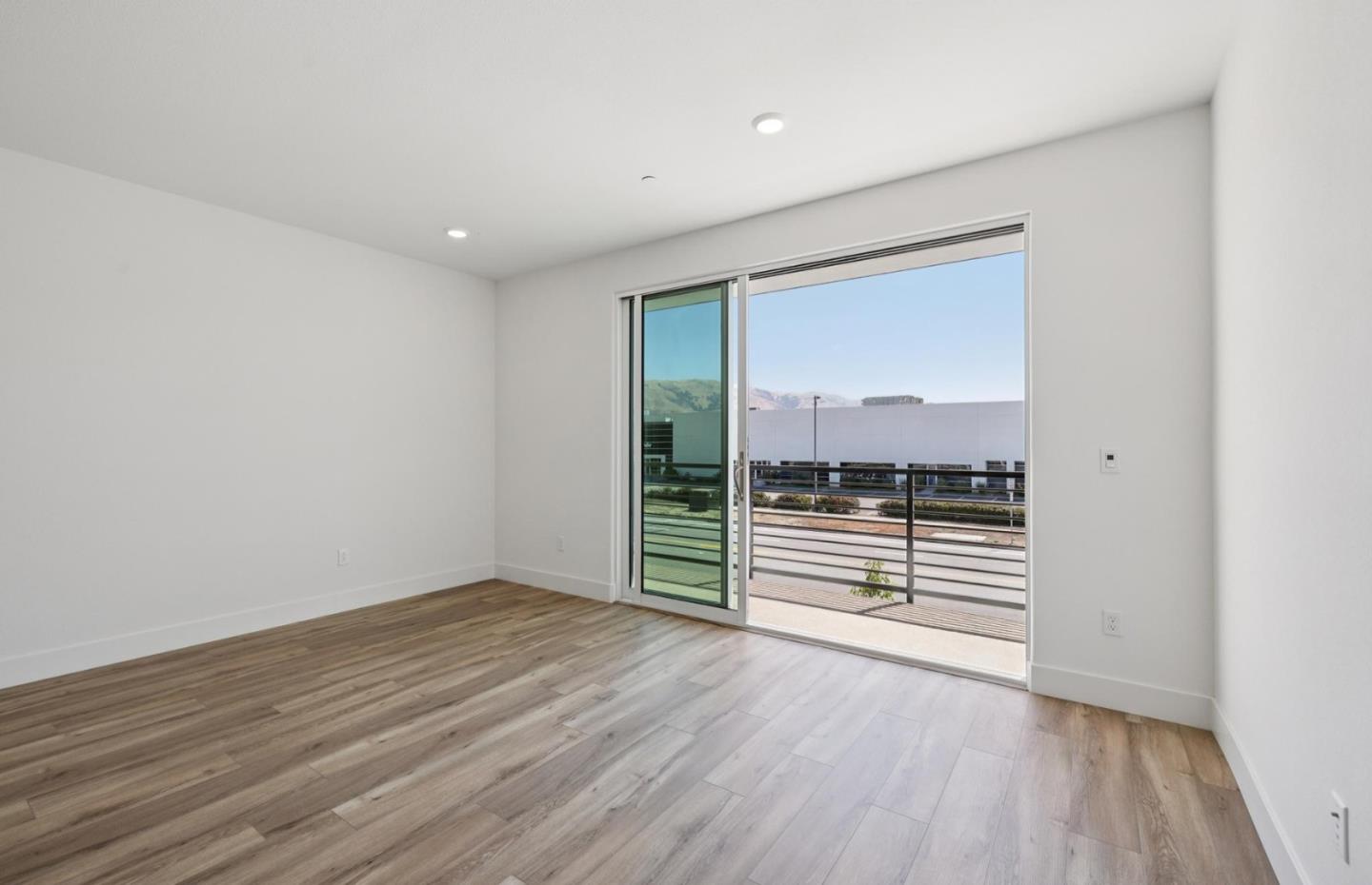 1357 Lilac Way Milpitas, CA 95035 - Photo 34 of 62 wooden floor in an empty room with a window