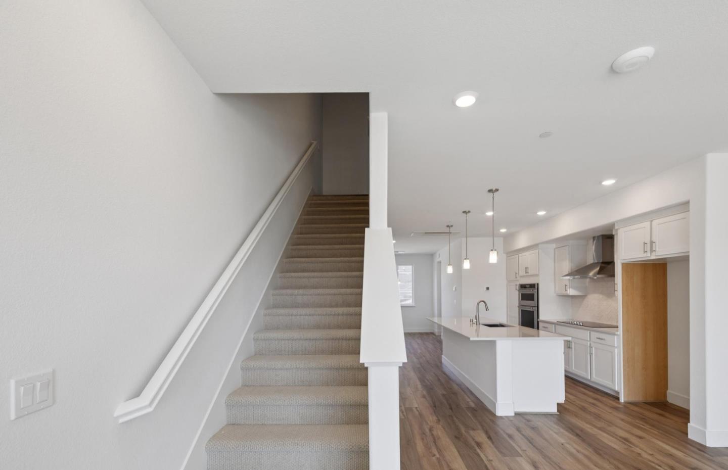 1357 Lilac Way Milpitas, CA 95035 - Photo 39 of 62 a view of kitchen with wooden floor and electronic appliances