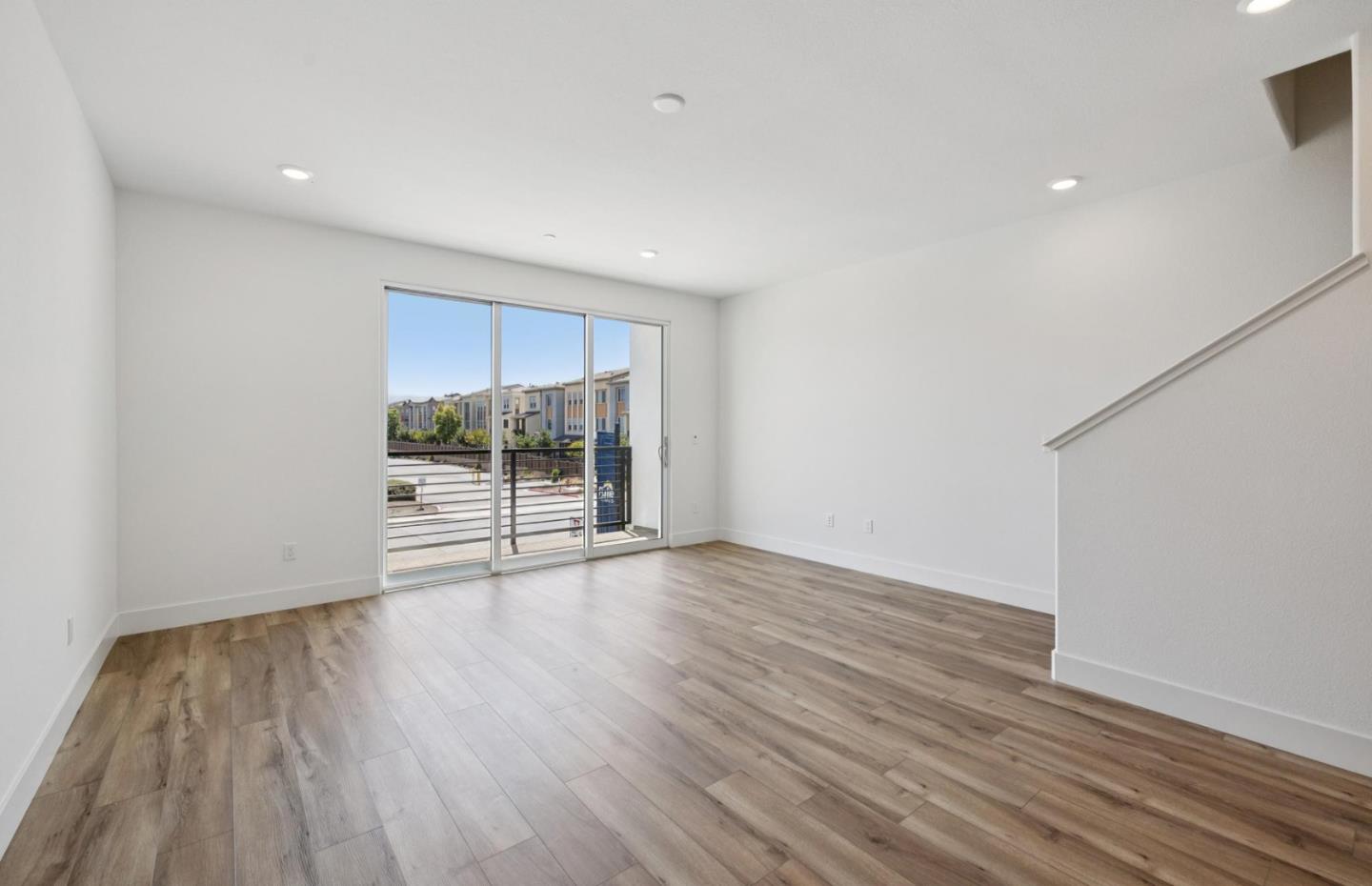 1357 Lilac Way Milpitas, CA 95035 - Photo 48 of 62 a view of an empty room with wooden floor and a window