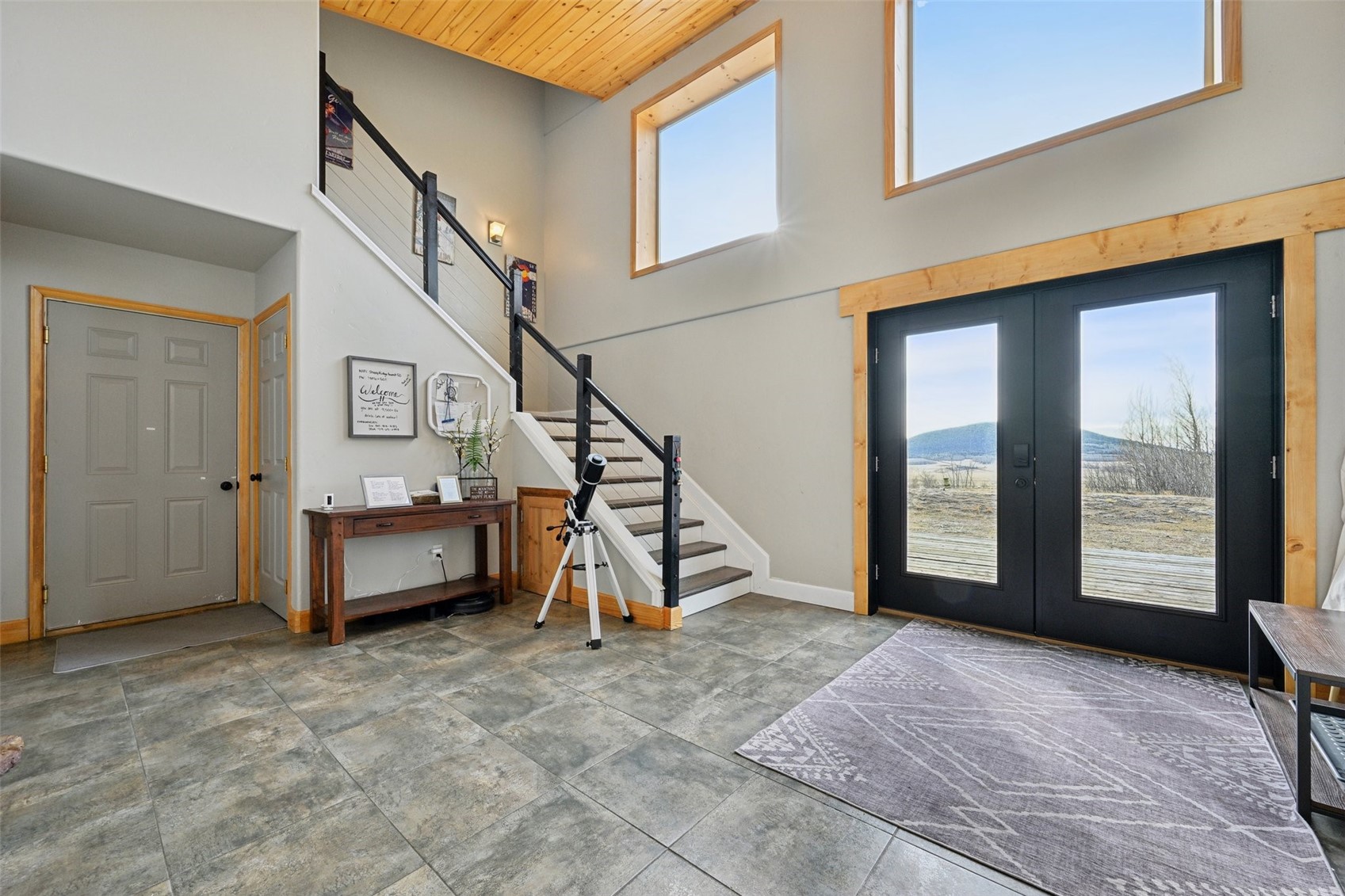 1499 Sheep Ridge Road Fairplay, CO 80440 - Photo 3 of 40 a view of a livingroom with furniture and staircase