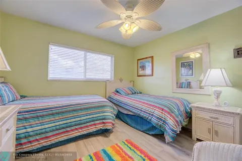 a balcony with table and chairs