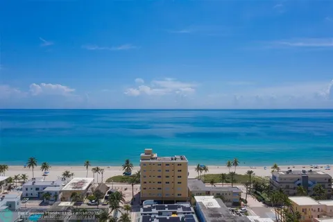 a view of building with ocean view