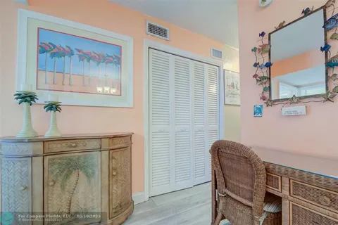 a kitchen with stainless steel appliances granite countertop a refrigerator and a stove