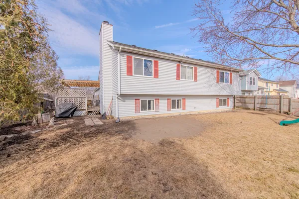 a view of street with large trees