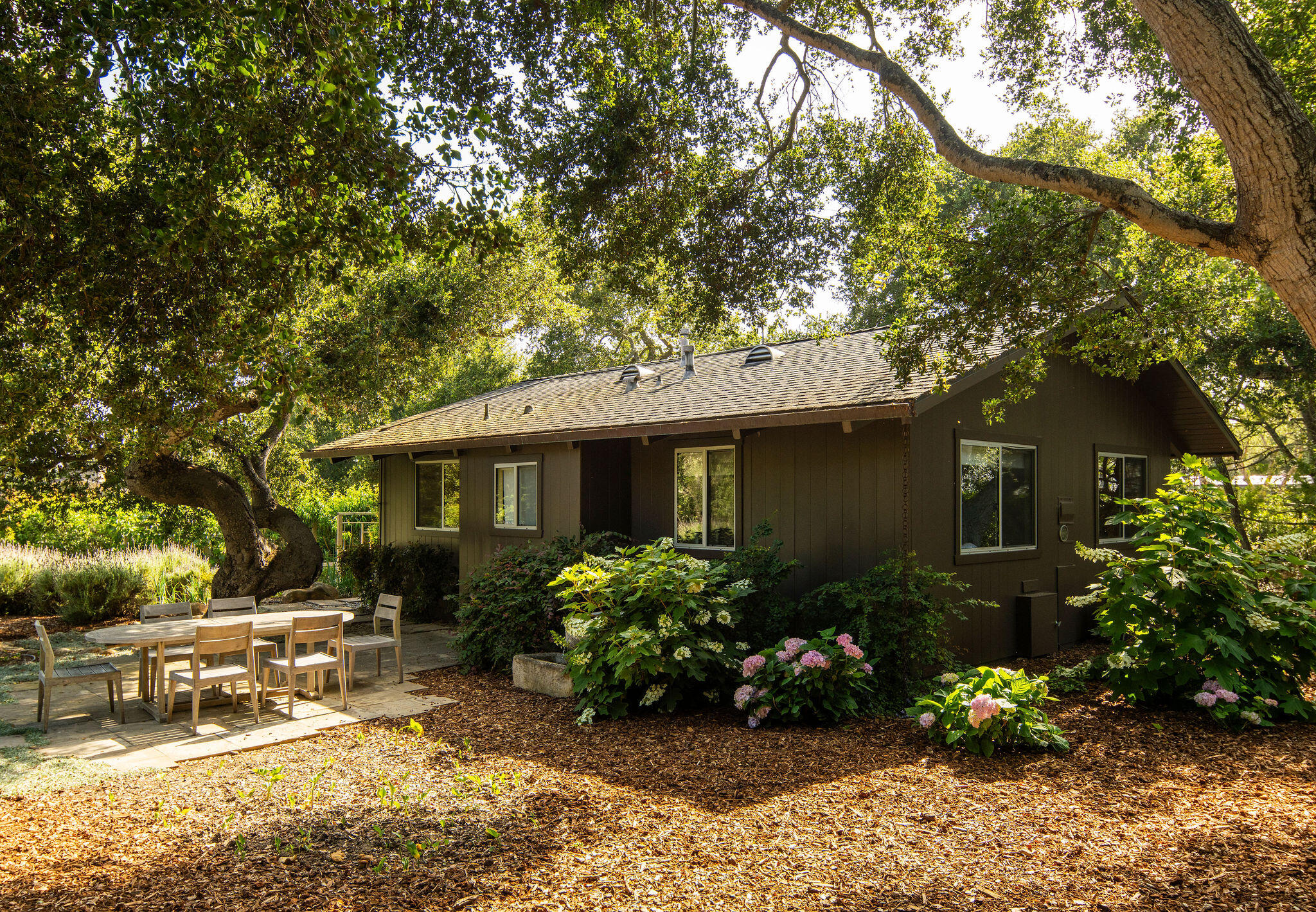 650 San Ysidro Road Montecito, CA 93108 - Photo 47 of 54 a front view of a house with garden