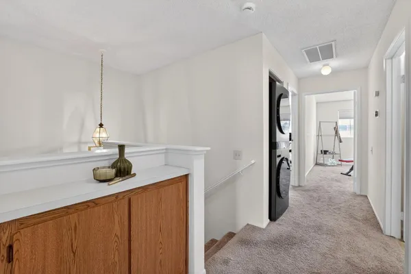 a room with furniture and a window