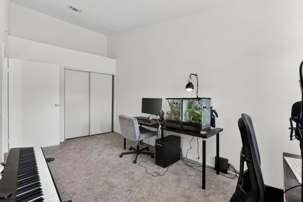 a view of backyard with seating space