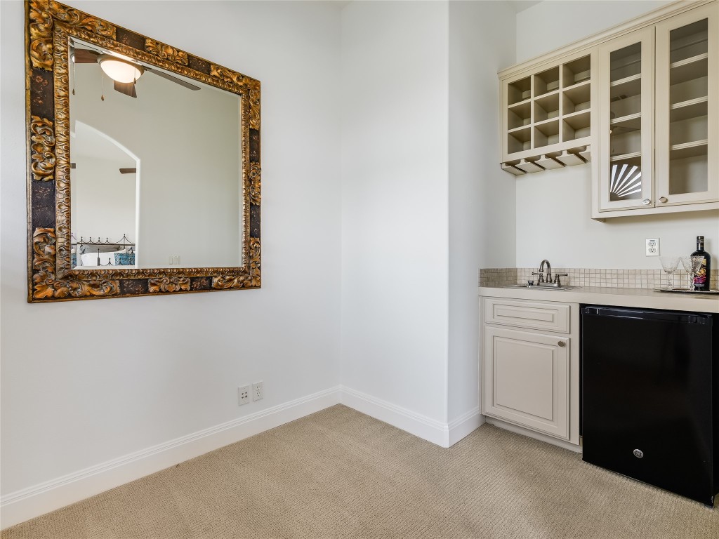 17545 West Reed Park Road, Unit 5 Jonestown, TX 78645 - Photo 16 of 26 a bathroom with a sink and a mirror