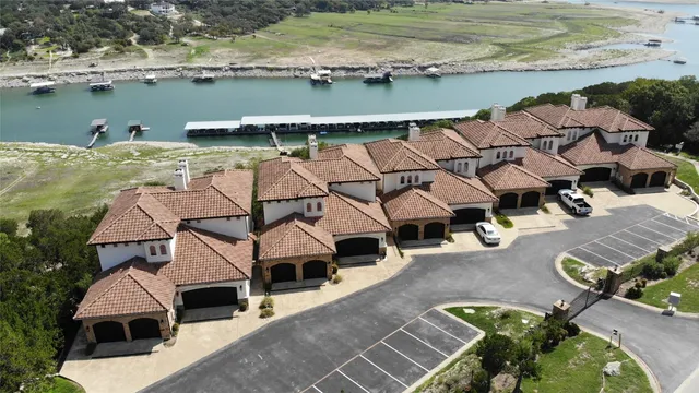 an aerial view of a house with a ocean view