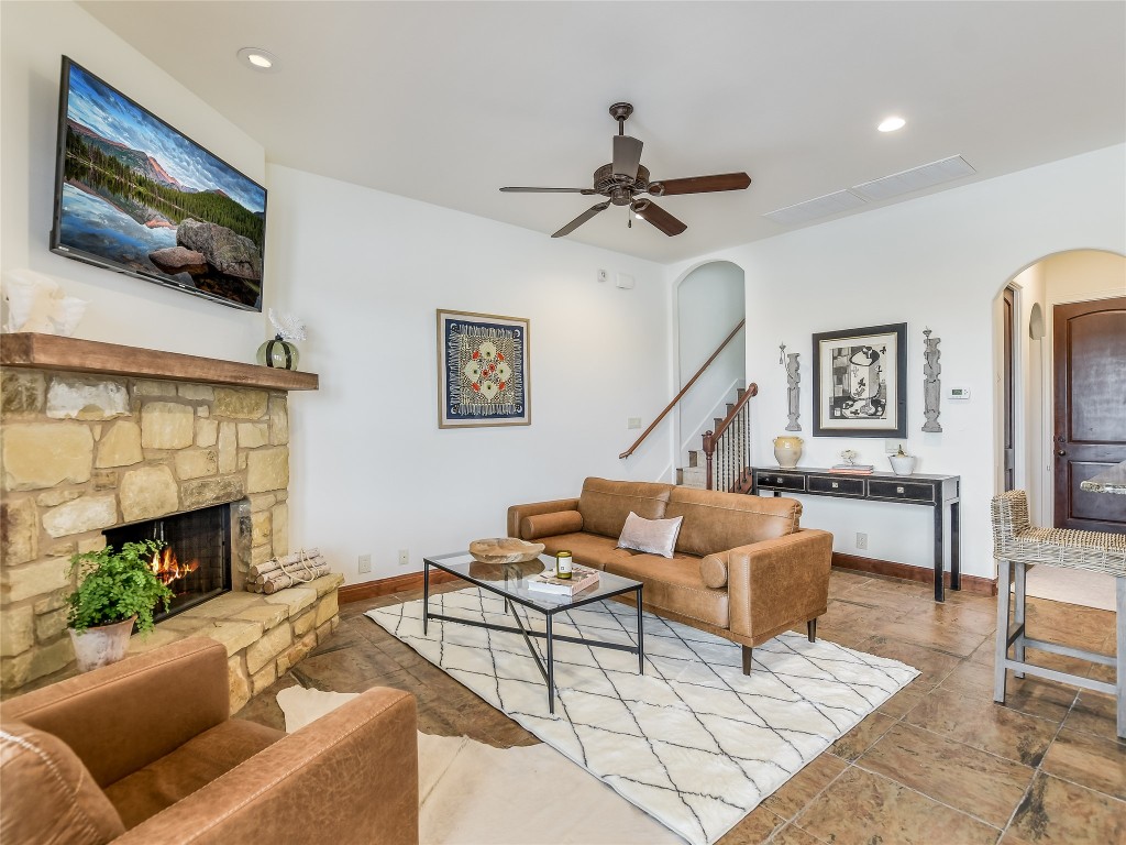 17545 West Reed Park Road, Unit 5 Jonestown, TX 78645 - Photo 7 of 26 a living room with furniture and a flat screen tv