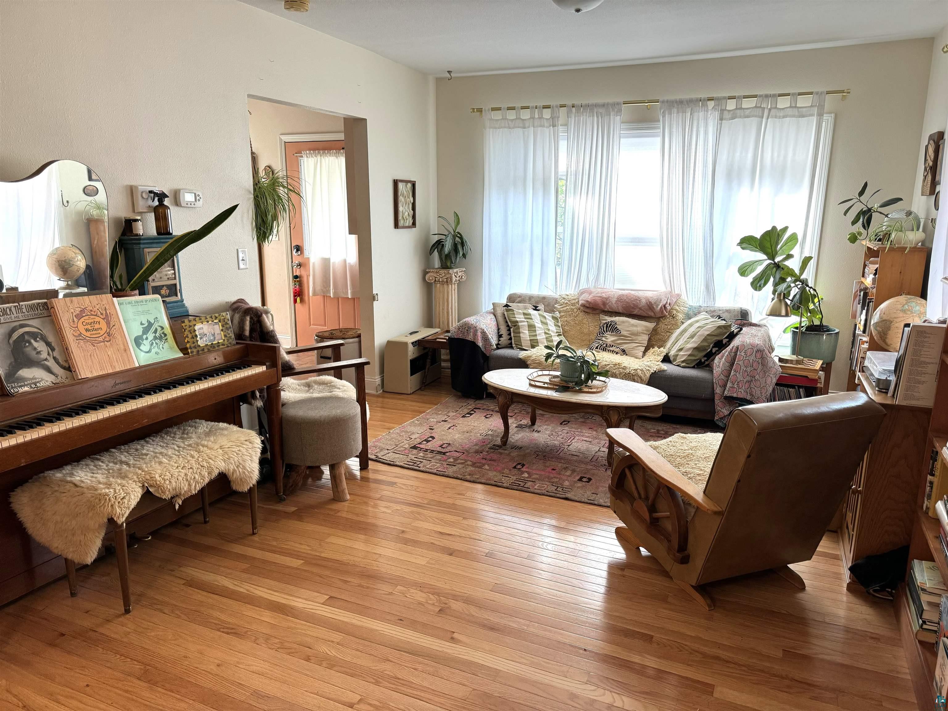 33 Riverside Drive Duluth, MN 55808 - Photo 9 of 25 Living room featuring light wood-type flooring