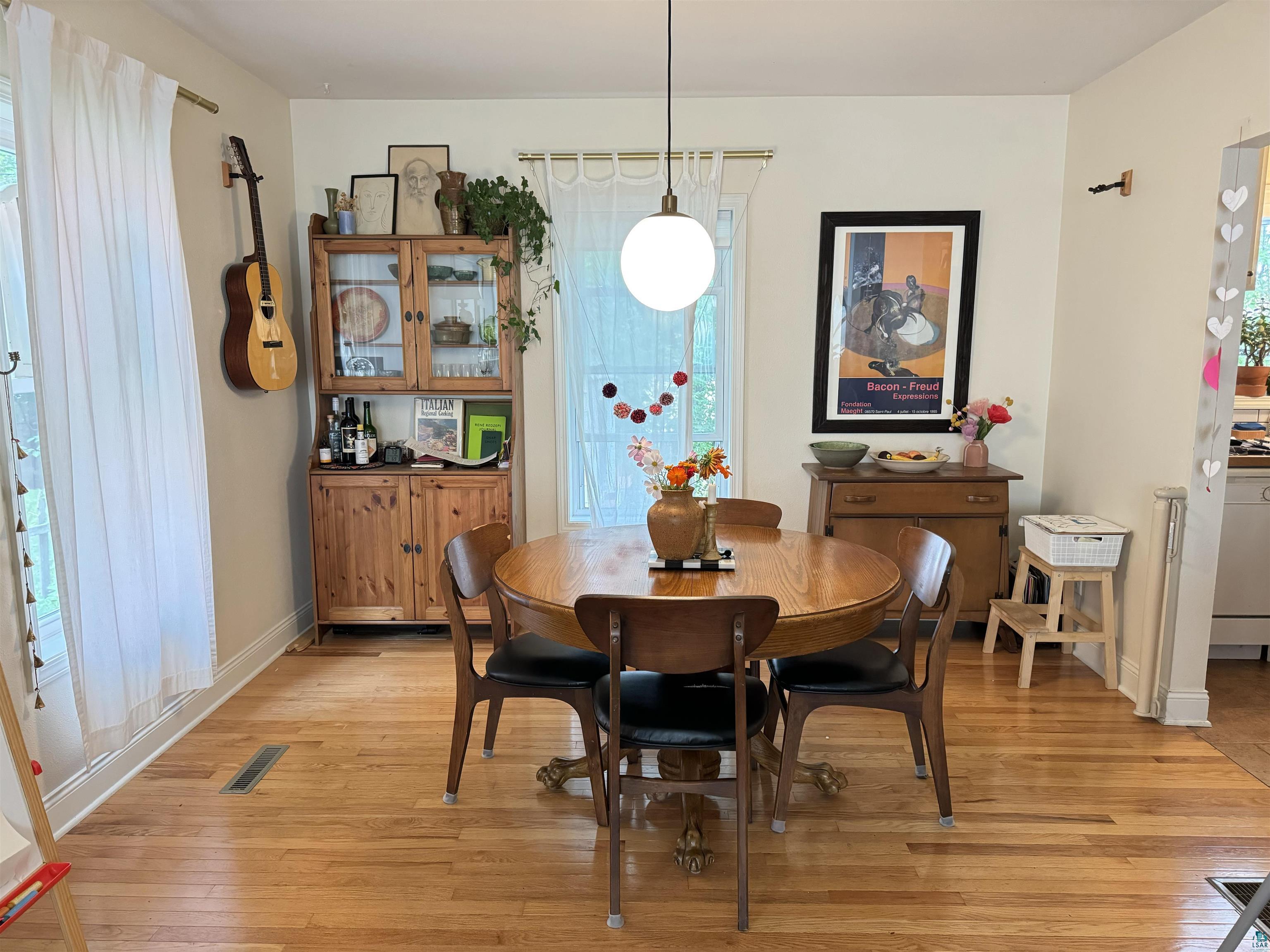 33 Riverside Drive Duluth, MN 55808 - Photo 10 of 25 Dining room with plenty of natural light and light hardwood / wood-style floors