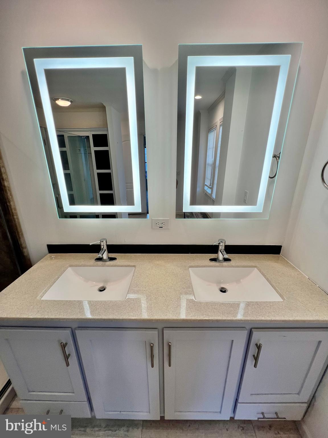 485 Keith Court Lothian, MD 20711 - Photo 15 of 23 a bathroom with a sink and a mirror