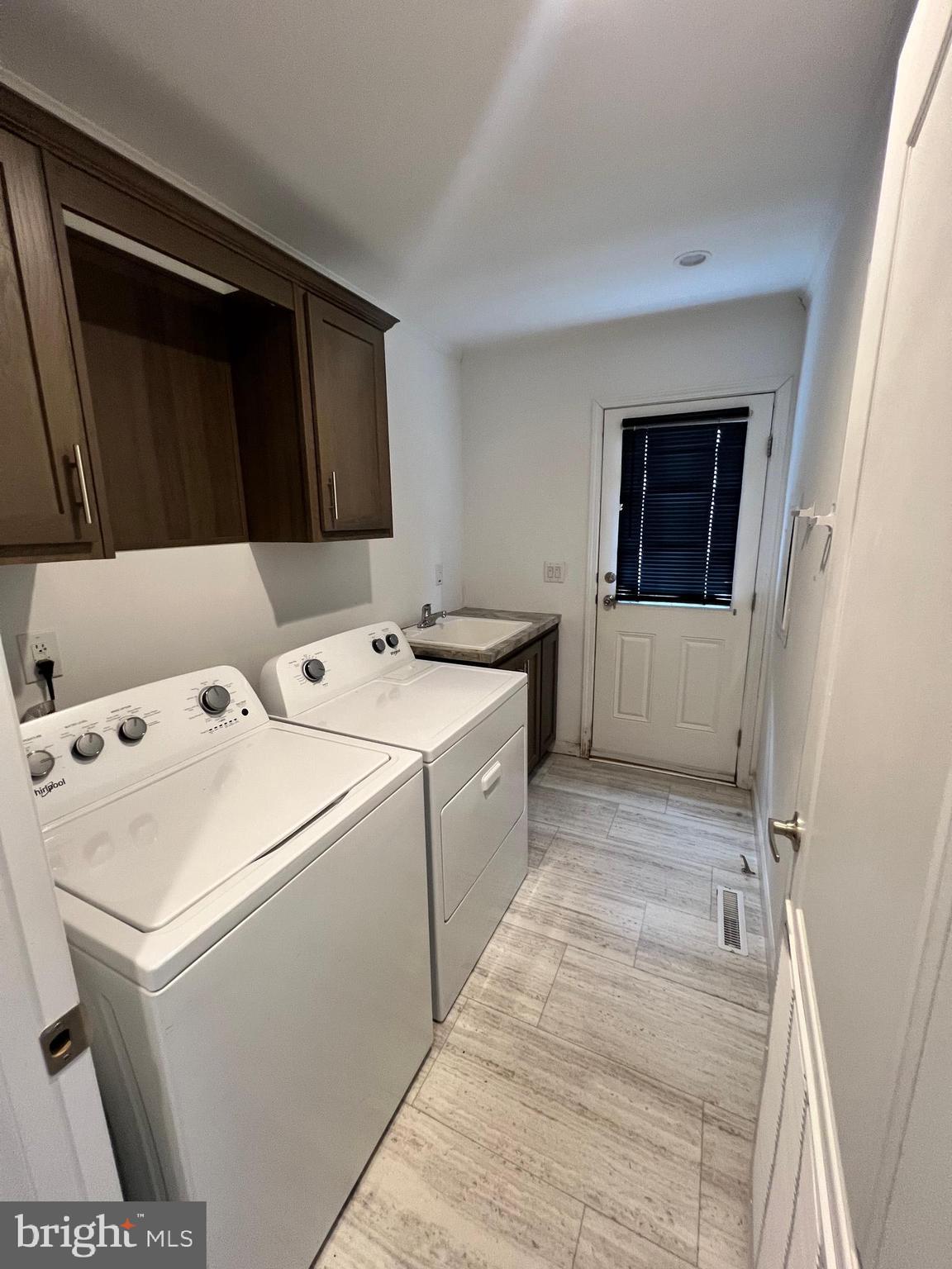 485 Keith Court Lothian, MD 20711 - Photo 19 of 23 a utility room with dryer and washer