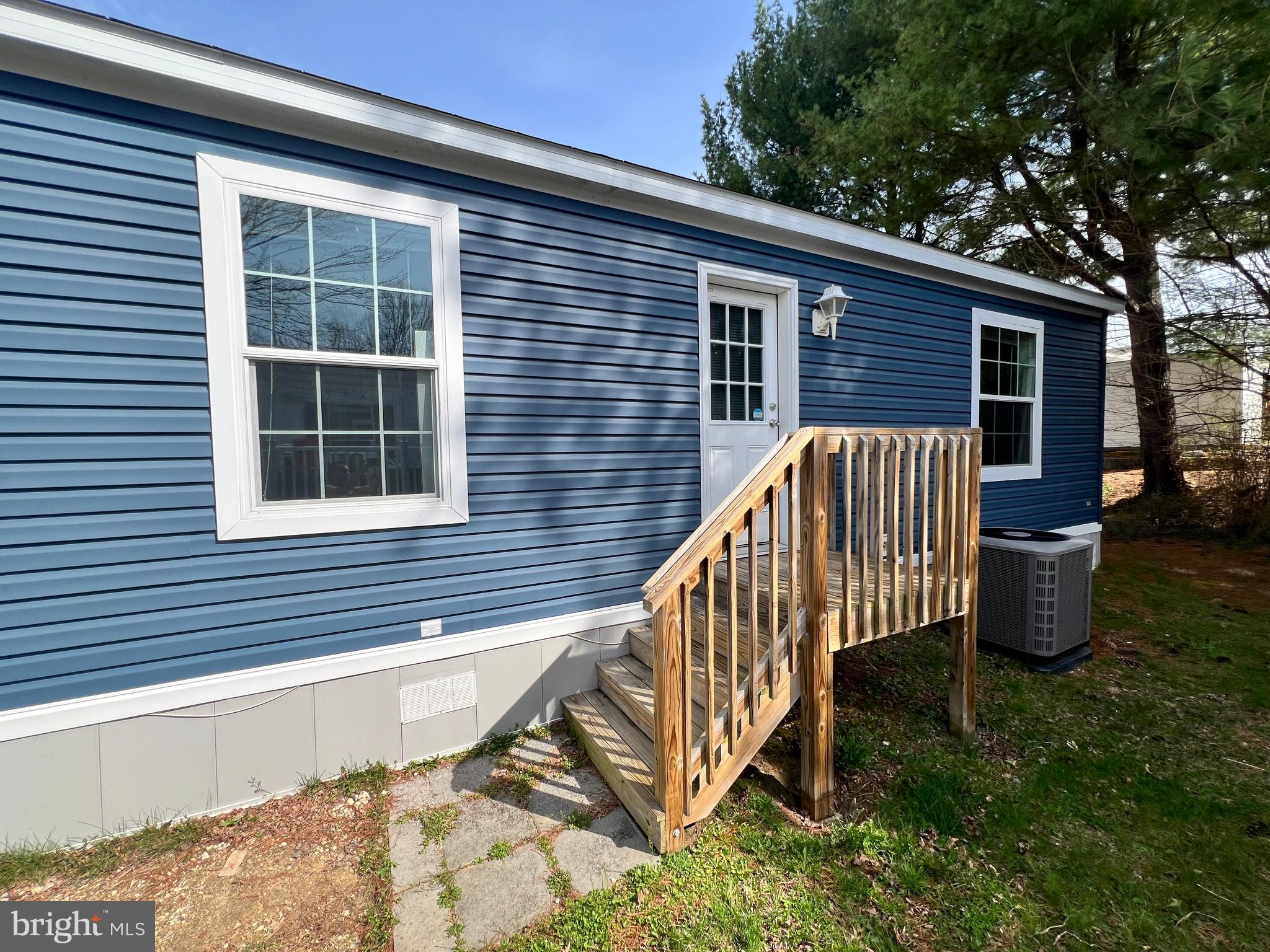 485 Keith Court Lothian, MD 20711 - Photo 20 of 23 a view of a house with backyard and sitting area