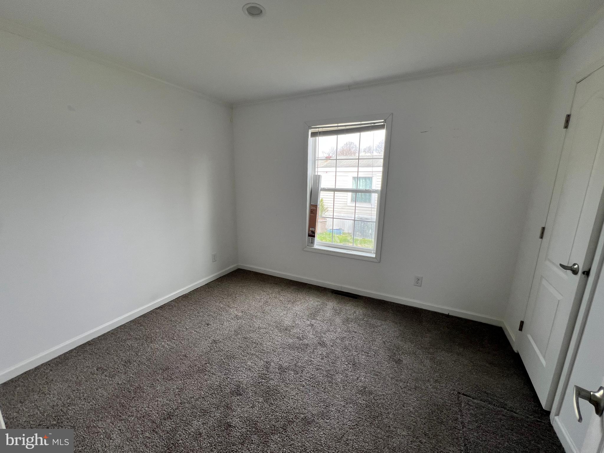 485 Keith Court Lothian, MD 20711 - Photo 8 of 23 an empty room with a window