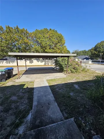 a view of a swimming pool with an ocean view