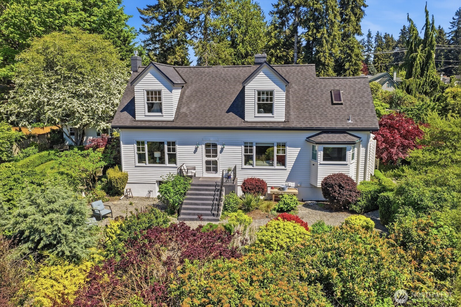 7219 Soundview Drive Edmonds, WA 98026 - Photo 1 of 40 a front view of a house with a yard