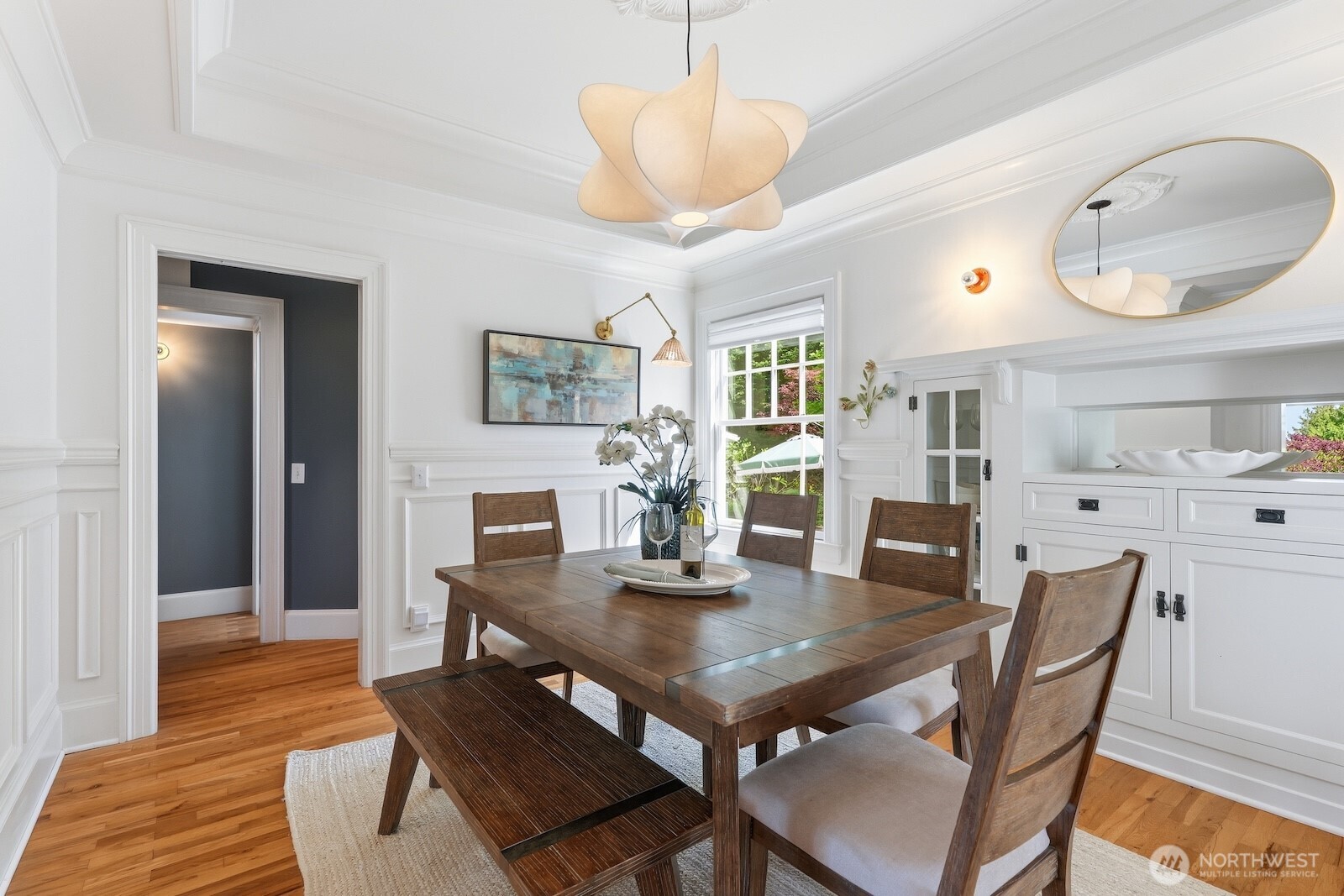 7219 Soundview Drive Edmonds, WA 98026 - Photo 13 of 40 a view of a dining room with furniture and wooden floor