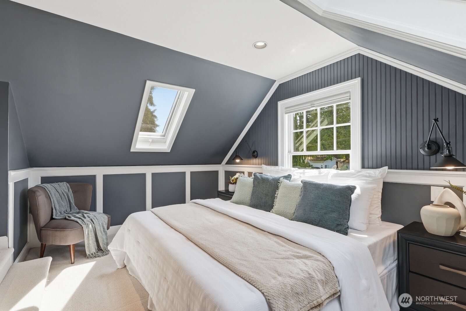 7219 Soundview Drive Edmonds, WA 98026 - Photo 18 of 40 a bedroom with a bed and a large window