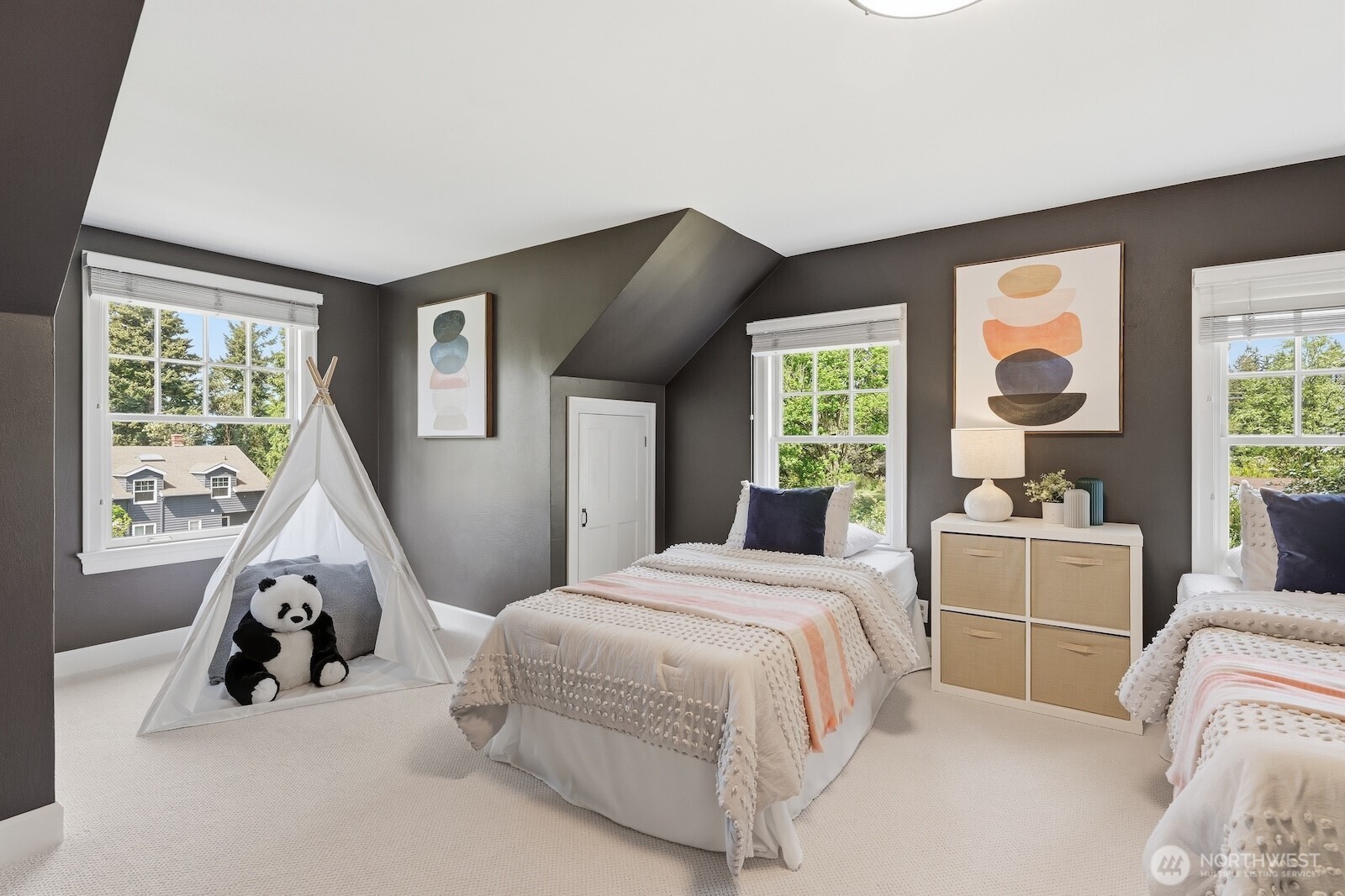 7219 Soundview Drive Edmonds, WA 98026 - Photo 21 of 40 a bedroom with a bed and a large window