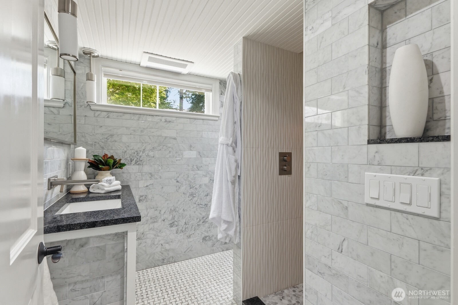 7219 Soundview Drive Edmonds, WA 98026 - Photo 25 of 40 a bathroom with a granite countertop shower a sink and a stove