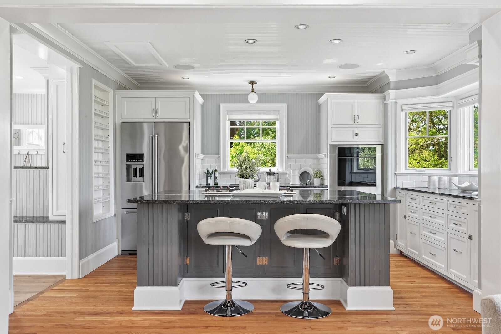 7219 Soundview Drive Edmonds, WA 98026 - Photo 8 of 40 a kitchen with refrigerator and table