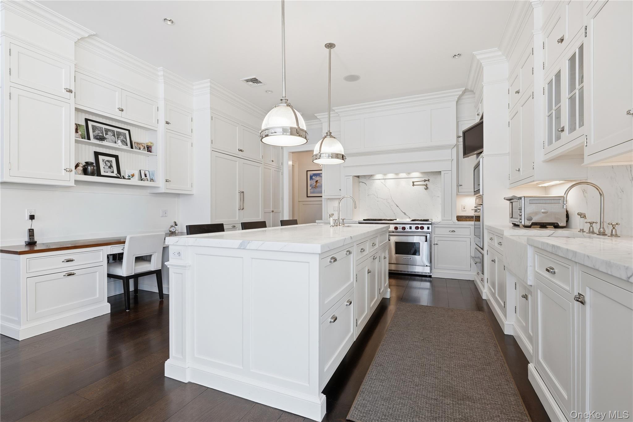 16 Wrights Mill Road Armonk, NY 10504 - Photo 14 of 49 a kitchen with cabinets a sink and white appliances
