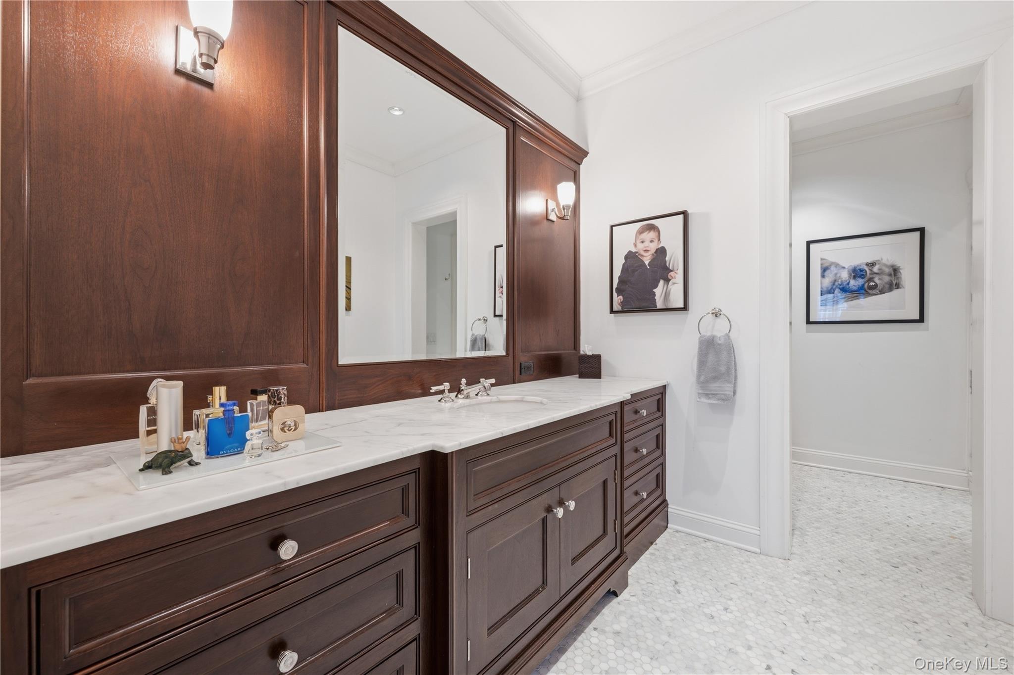 16 Wrights Mill Road Armonk, NY 10504 - Photo 25 of 49 a bathroom with a double vanity sink and a mirror
