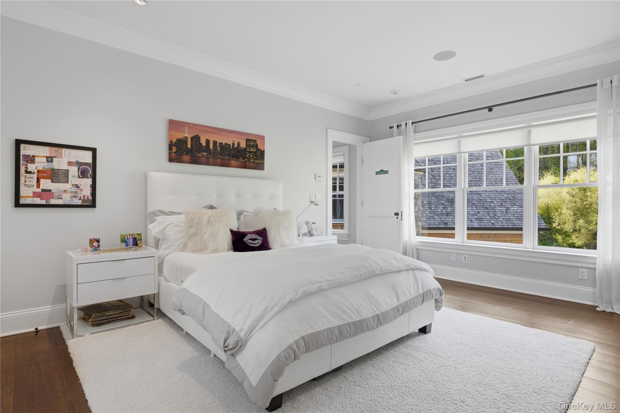 16 Wrights Mill Road Armonk, NY 10504 - Photo 26 of 49 a bedroom with a large bed and a large window