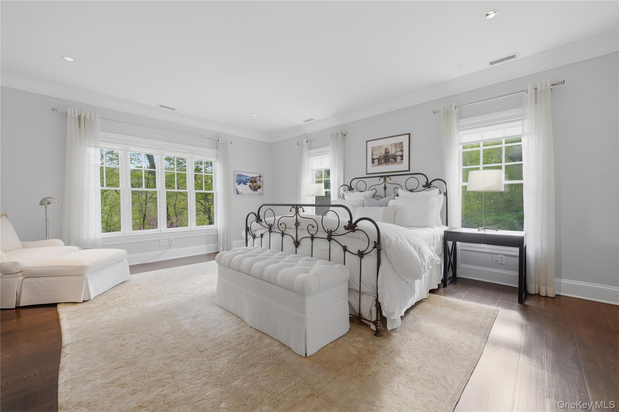 16 Wrights Mill Road Armonk, NY 10504 - Photo 29 of 49 a bed sitting in a spacious bedroom next to a window