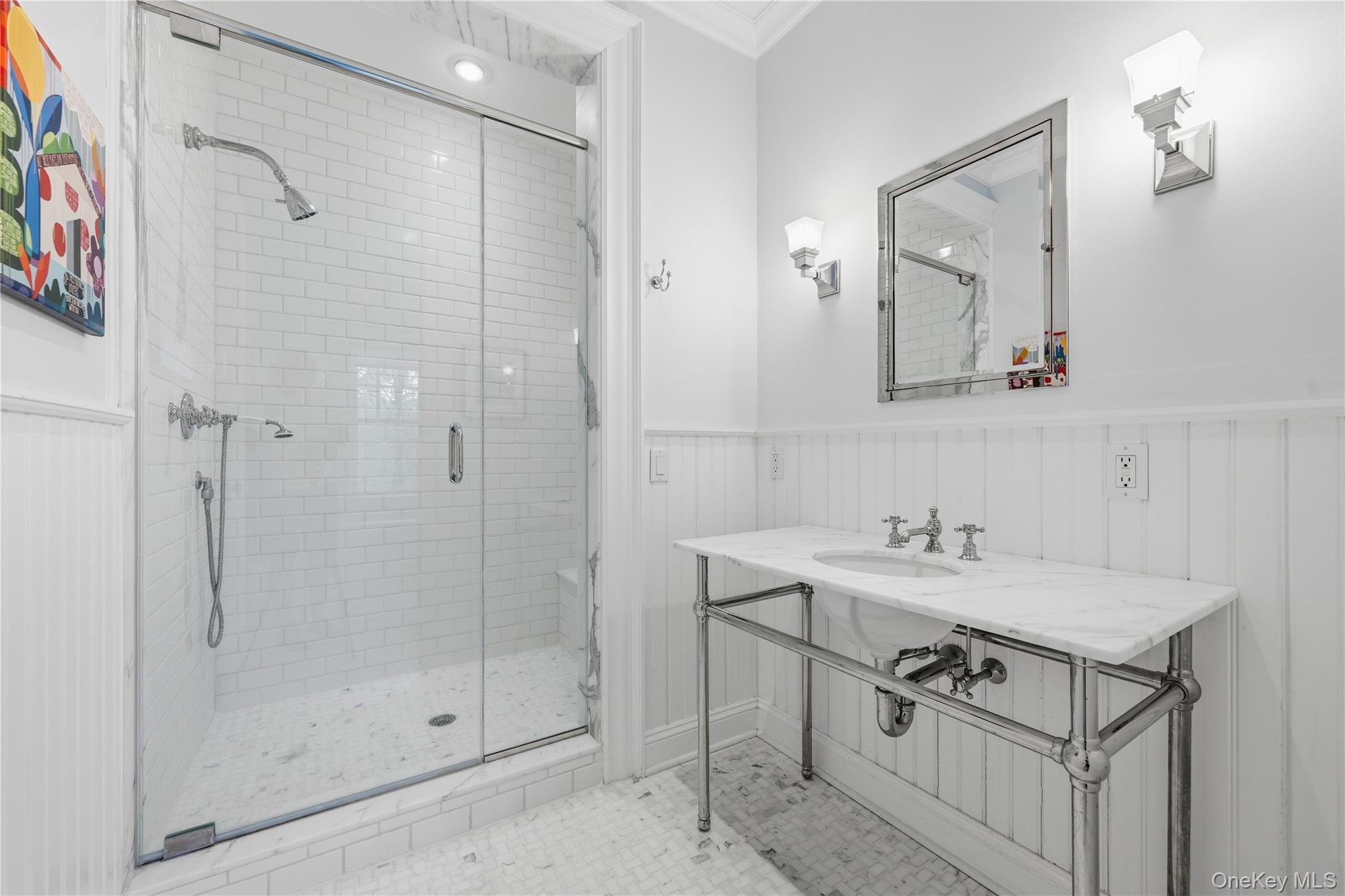 16 Wrights Mill Road Armonk, NY 10504 - Photo 30 of 49 a bathroom with a sink a mirror a vanity and a shower
