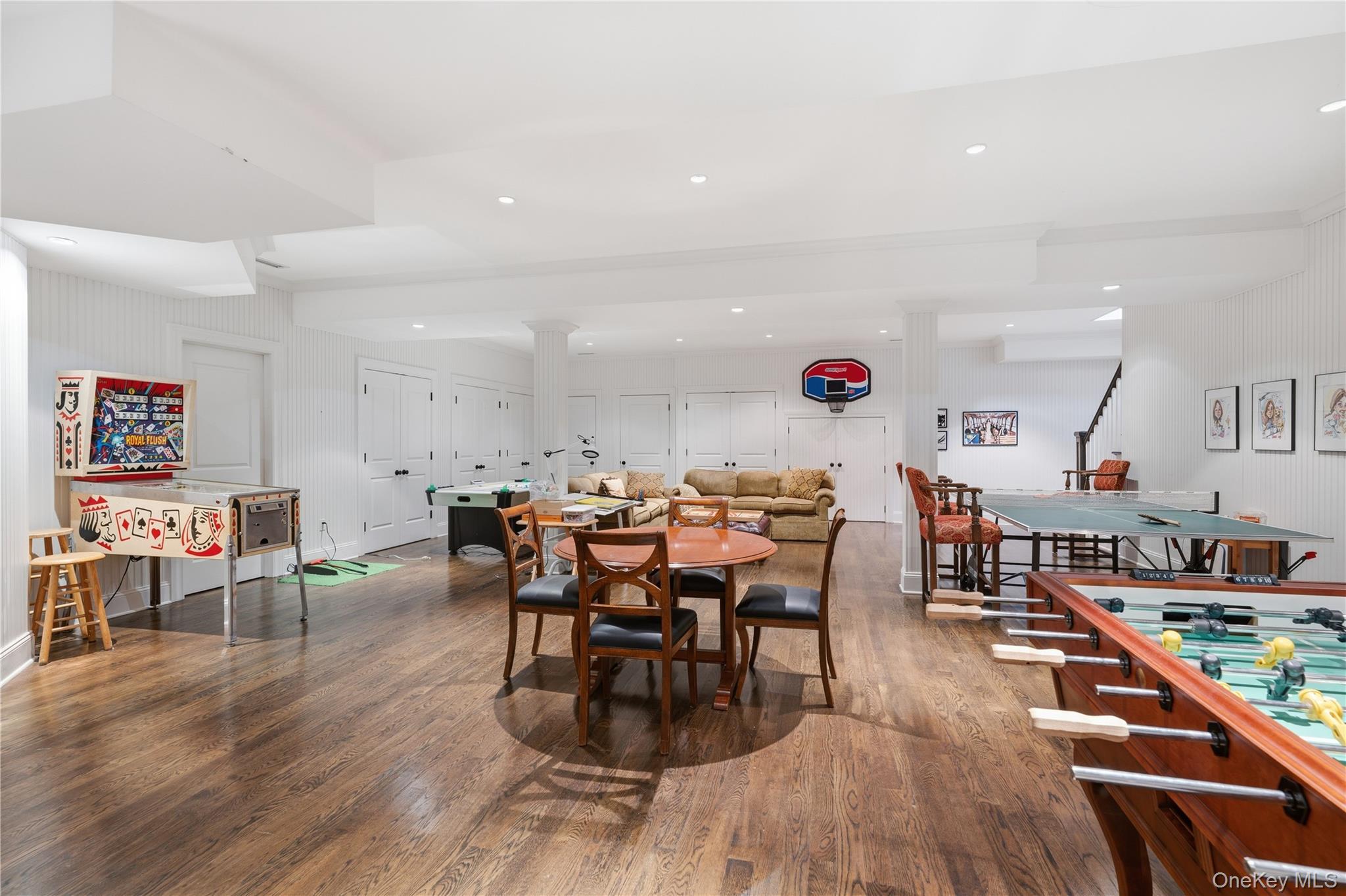 16 Wrights Mill Road Armonk, NY 10504 - Photo 36 of 49 a view of a dining area with furniture and wooden floor