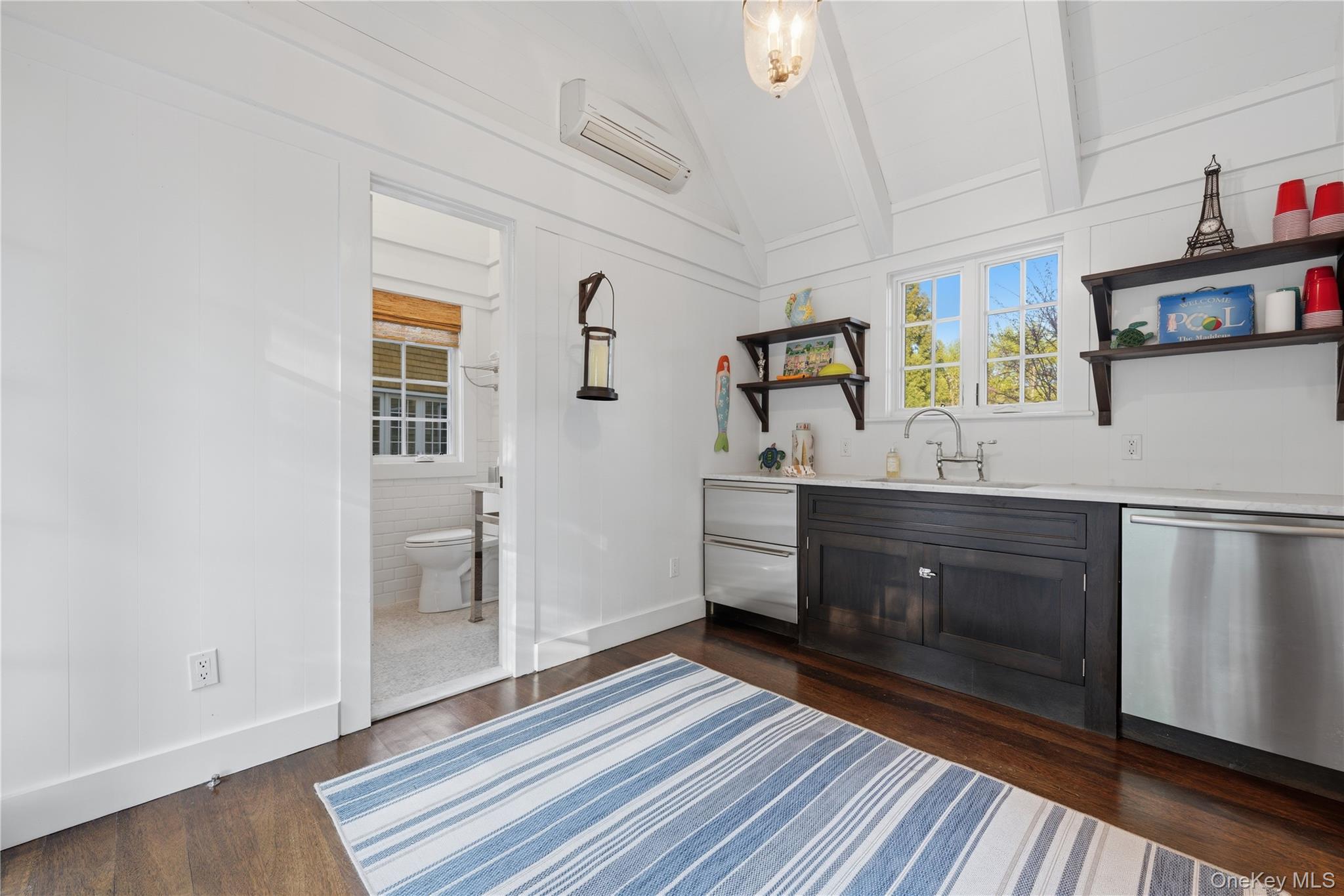 16 Wrights Mill Road Armonk, NY 10504 - Photo 39 of 49 a spacious bathroom with a sink a mirror and shower
