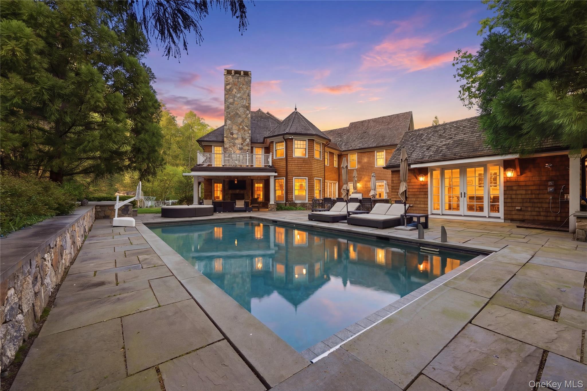 16 Wrights Mill Road Armonk, NY 10504 - Photo 4 of 49 a view of a patio with swimming pool