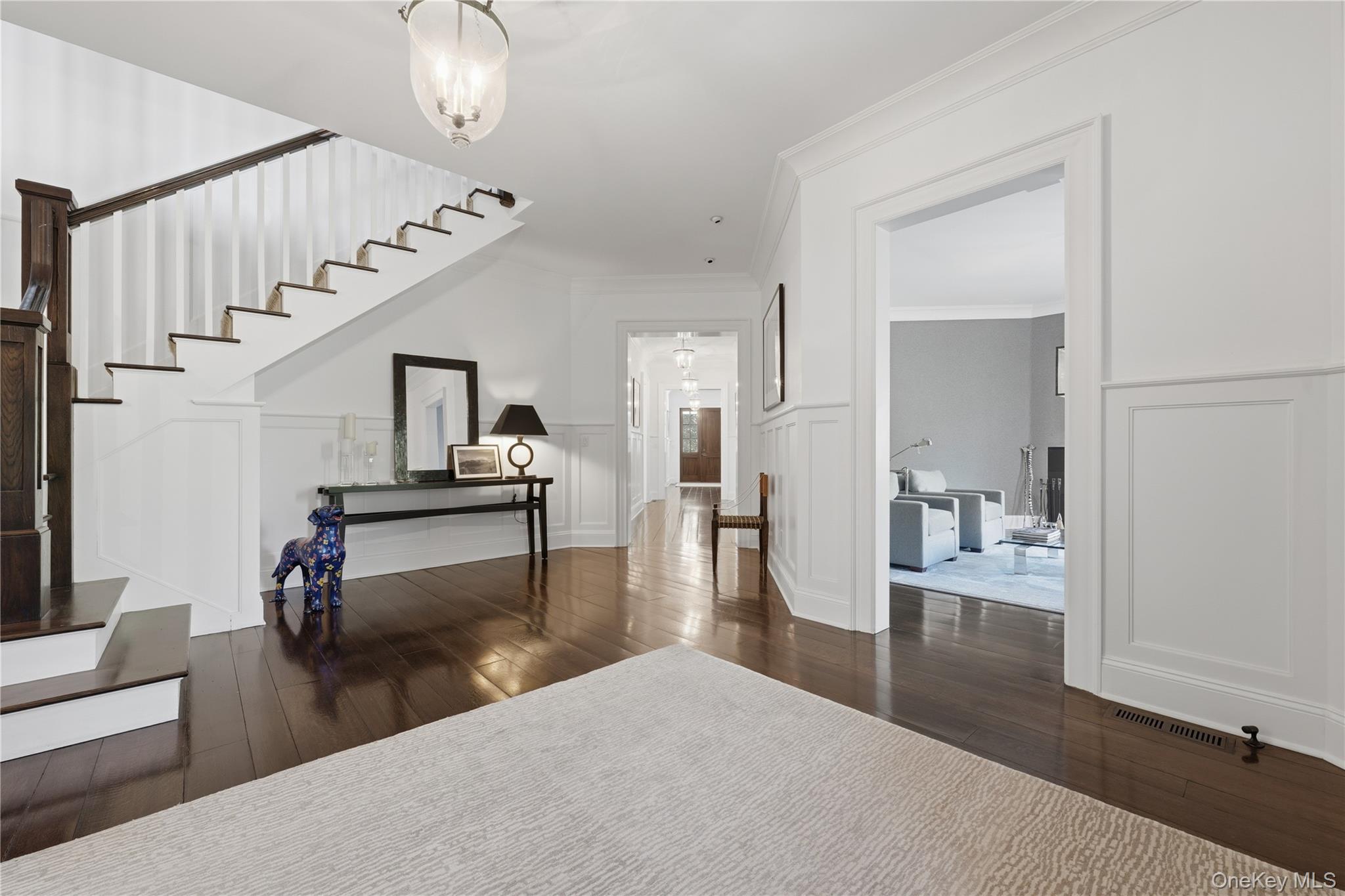 16 Wrights Mill Road Armonk, NY 10504 - Photo 6 of 49 a hallway with wooden floor and furniture